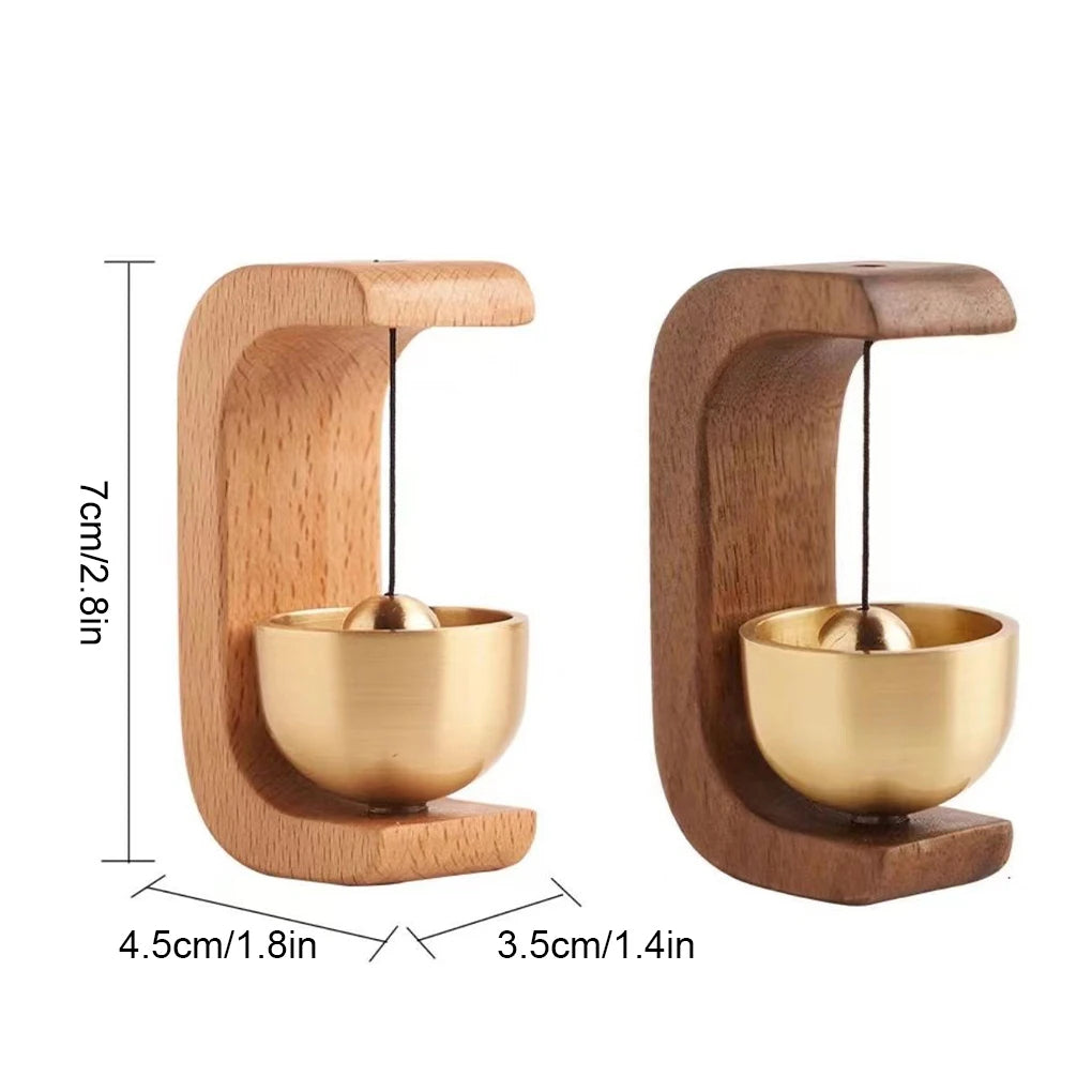 Wireless door chime with brass bell and wood frame